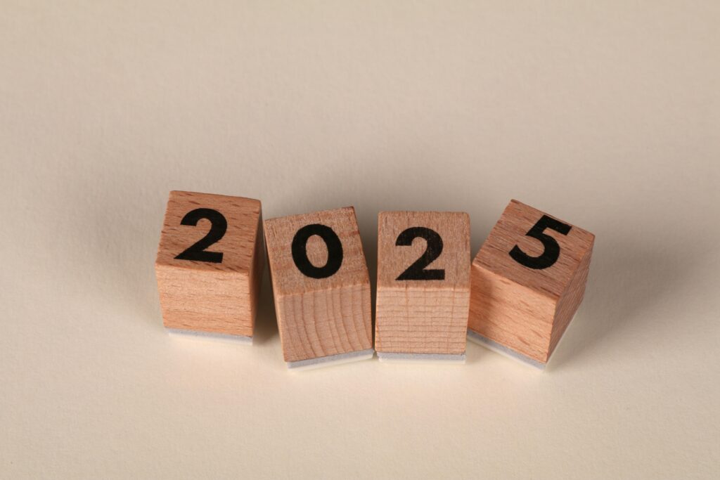 Wooden blocks creatively arranged to represent the year 2025, perfect for New Year themes.